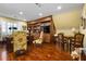 Home office with built-in shelving, a desk, and a small sitting area at 2111 Cooper Lake Se Rd, Smyrna, GA 30080