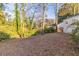 Large backyard with a wooded area offering privacy and a natural setting at 1807 Oakmont Nw Dr, Atlanta, GA 30314