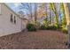 Large backyard with mature trees and side yard at 1807 Oakmont Nw Dr, Atlanta, GA 30314