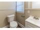 Clean bathroom with white vanity and flooring at 1807 Oakmont Nw Dr, Atlanta, GA 30314