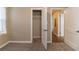 Bedroom with built-in closet and access to hallway at 1807 Oakmont Nw Dr, Atlanta, GA 30314