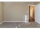 Bedroom with ensuite bathroom access and large windows at 1807 Oakmont Nw Dr, Atlanta, GA 30314