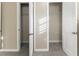 Bedroom with two closets and neutral-colored carpet at 1807 Oakmont Nw Dr, Atlanta, GA 30314