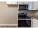 Modern kitchen with stainless steel appliances and granite countertops at 1807 Oakmont Nw Dr, Atlanta, GA 30314