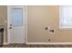 Laundry area with exterior access and window at 1807 Oakmont Nw Dr, Atlanta, GA 30314