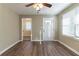Living room featuring wood-look floors and access to the kitchen at 1807 Oakmont Nw Dr, Atlanta, GA 30314
