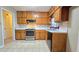 Well-equipped kitchen featuring wood cabinets and stainless steel appliances at 4817 Huntsman Bnd, Decatur, GA 30034