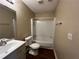 Clean bathroom with tub and shower combo at 1153 Village Main St, Stone Mountain, GA 30088