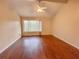 Bedroom with large window and wood floors at 1153 Village Main St, Stone Mountain, GA 30088
