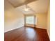 Bright bedroom with large window and wood floors at 1153 Village Main St, Stone Mountain, GA 30088