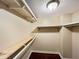 Large closet with wood shelving and rod at 1153 Village Main St, Stone Mountain, GA 30088