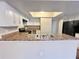 Kitchen with white cabinets, stainless steel appliances, and a double sink at 1153 Village Main St, Stone Mountain, GA 30088