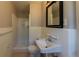 Clean bathroom with white tile and shower at 3457 Springlake Dr, Decatur, GA 30032