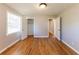 Hardwood floor bedroom with two closets and a window at 3457 Springlake Dr, Decatur, GA 30032