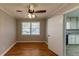 Spacious dining area with hardwood floors and ceiling fan at 3457 Springlake Dr, Decatur, GA 30032