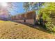 Brick ranch house with a large backyard and mature trees at 3457 Springlake Dr, Decatur, GA 30032