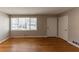 Living room with hardwood floors and large windows at 3457 Springlake Dr, Decatur, GA 30032