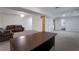 Spacious basement with desk, comfortable seating, and ample space at 4378 Ridge Ct, Loganville, GA 30052