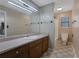 Bathroom with single vanity, tub/shower combo, and checkered tile floor at 4378 Ridge Ct, Loganville, GA 30052