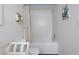 Clean bathroom with white tile, a shower/tub combo, and nautical-themed decor at 4378 Ridge Ct, Loganville, GA 30052