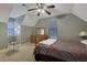 Spacious bedroom with large bed, ceiling fan, and seating area at 4378 Ridge Ct, Loganville, GA 30052
