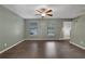 Inviting living room with ceiling fan and plenty of natural light at 4378 Ridge Ct, Loganville, GA 30052