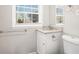 Updated bathroom with granite vanity and neutral colors at 2625 Crestdale Se Cir, Atlanta, GA 30316