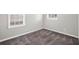 Simple bedroom with neutral walls and gray carpeting at 2625 Crestdale Se Cir, Atlanta, GA 30316