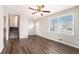 Living room with hardwood floors, neutral walls, and stairs at 2625 Crestdale Se Cir, Atlanta, GA 30316