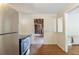 Kitchen with stainless steel appliances and an open doorway to another room at 1382 Georgia Ave, Atlanta, GA 30344