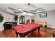 Game room with pool table, foosball, and comfortable seating at 800 Peachtree Ne St # 8205, Atlanta, GA 30308