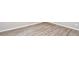 New wood-look flooring shown in a well-lit empty room at 1344 Mill Lake Cir, Stone Mountain, GA 30088