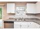 Kitchen with white cabinets, granite countertops, and stainless steel appliances at 1344 Mill Lake Cir, Stone Mountain, GA 30088