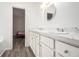 Bathroom with double vanity, marble countertop and a view to a bedroom at 155 Meadowbrook Dr, Mcdonough, GA 30253