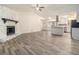 Open concept kitchen with island, stainless steel appliances, and white cabinets at 155 Meadowbrook Dr, Mcdonough, GA 30253