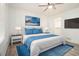 Main bedroom with wood-look floors and blue accents at 155 Meadowbrook Dr, Mcdonough, GA 30253