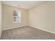 Bedroom with carpet flooring and a window at 2329 Wilkins Cv, Decatur, GA 30035