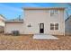 Two-story house with backyard patio and AC unit at 2329 Wilkins Cv, Decatur, GA 30035