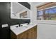 Modern bathroom with double vanity and large mirror at 1933 Glen Echo Dr, Decatur, GA 30032