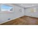 Bright bedroom with hardwood floors and neutral walls at 1933 Glen Echo Dr, Decatur, GA 30032