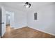 Light-filled bedroom with hardwood floors and ceiling fan at 1933 Glen Echo Dr, Decatur, GA 30032