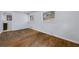 Bedroom with hardwood floors, neutral walls, and large windows at 1933 Glen Echo Dr, Decatur, GA 30032