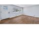 Bright living room with hardwood floors and large windows at 1933 Glen Echo Dr, Decatur, GA 30032