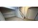 Unfinished basement with carpeted floor and stairs at 2030 Shamrock Dr, Decatur, GA 30032