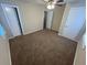 Spacious bedroom with neutral walls and carpet at 2030 Shamrock Dr, Decatur, GA 30032