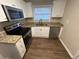 Updated kitchen, granite countertops, stainless steel appliances at 2030 Shamrock Dr, Decatur, GA 30032