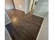Bright living room with dark laminate floors at 2030 Shamrock Dr, Decatur, GA 30032