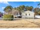 Fenced backyard with shed and ample green space at 1035 Stonewall Se Dr, Atlanta, GA 30315