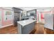 Modern kitchen with gray cabinets and island at 1035 Stonewall Se Dr, Atlanta, GA 30315