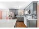 Modern kitchen with gray cabinets and island at 1035 Stonewall Se Dr, Atlanta, GA 30315